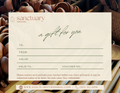 Gift card. shows wooden utensils in the back. the front shows details about gift card